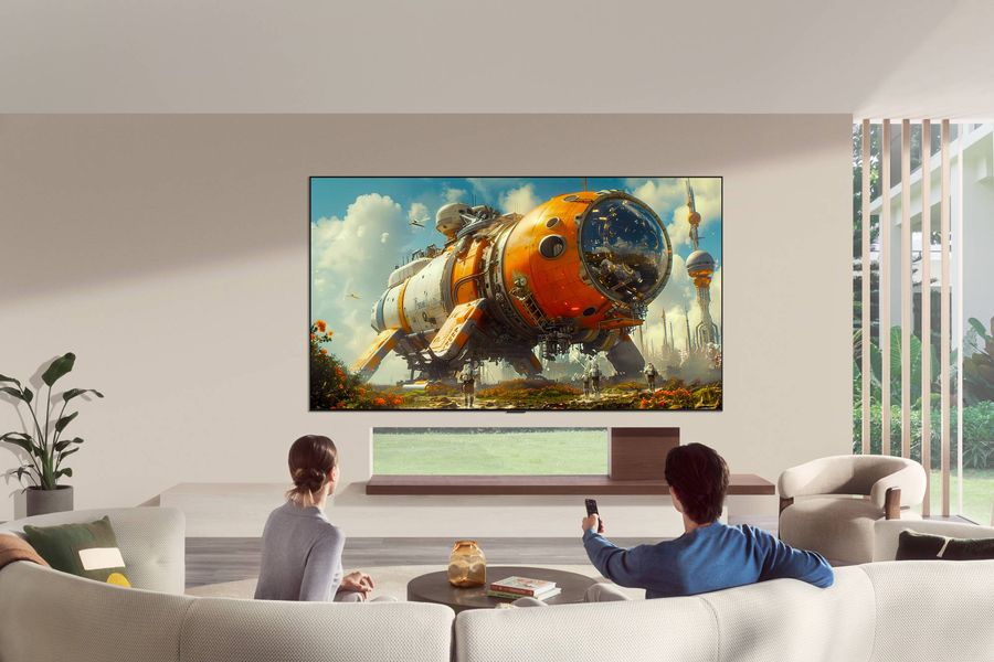 T&eacute;l&eacute;viseur LG OLED65G6 mural dans un salon moderne affiche une sc&egrave;ne de science-fiction color&eacute;e avec haute d&eacute;finition et contraste.
