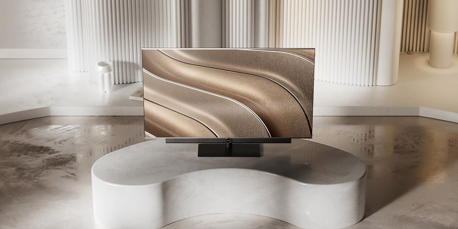 T&eacute;l&eacute;viseur OLED 4K Loewe Antares 55 avec barre de son Antares Soundbar, pr&eacute;sent&eacute; dans un int&eacute;rieur contemporain au design &eacute;pur&eacute;.