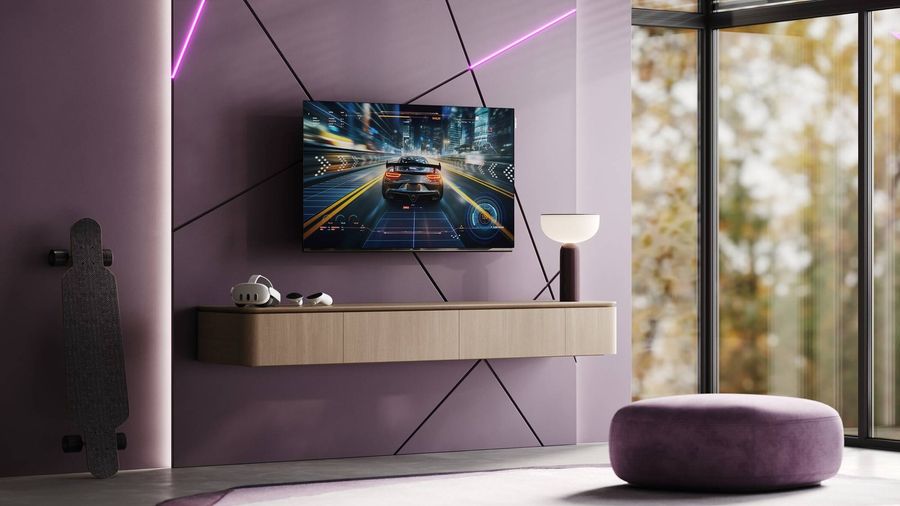 T&eacute;l&eacute;viseur 4K Loewe We. SEE 42 OLED dual channel affichant un jeu vid&eacute;o dans un espace de divertissement contemporain.