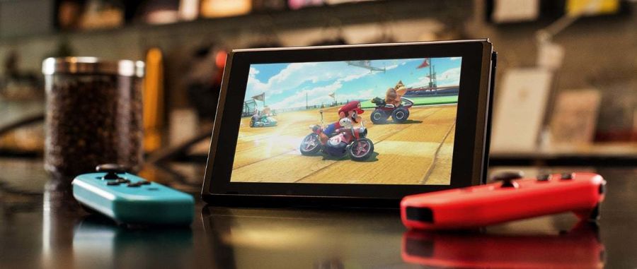 Jouez à la console Nintendo Switch sur l'écran OLED fourni
