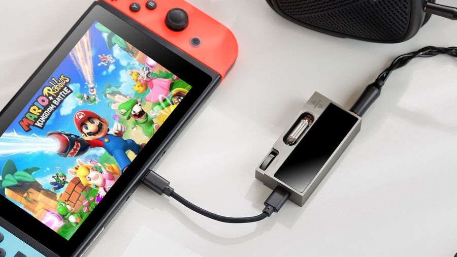 Le DAC Shanling UA7 connecté à une Nintendo Switch pour une qualité audio supérieure sans configuration.