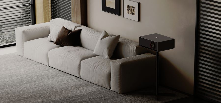 Pied de sol Xgimi pour projecteur Titan install&eacute; dans un salon, assurant un positionnement adapt&eacute; &agrave; la projection.