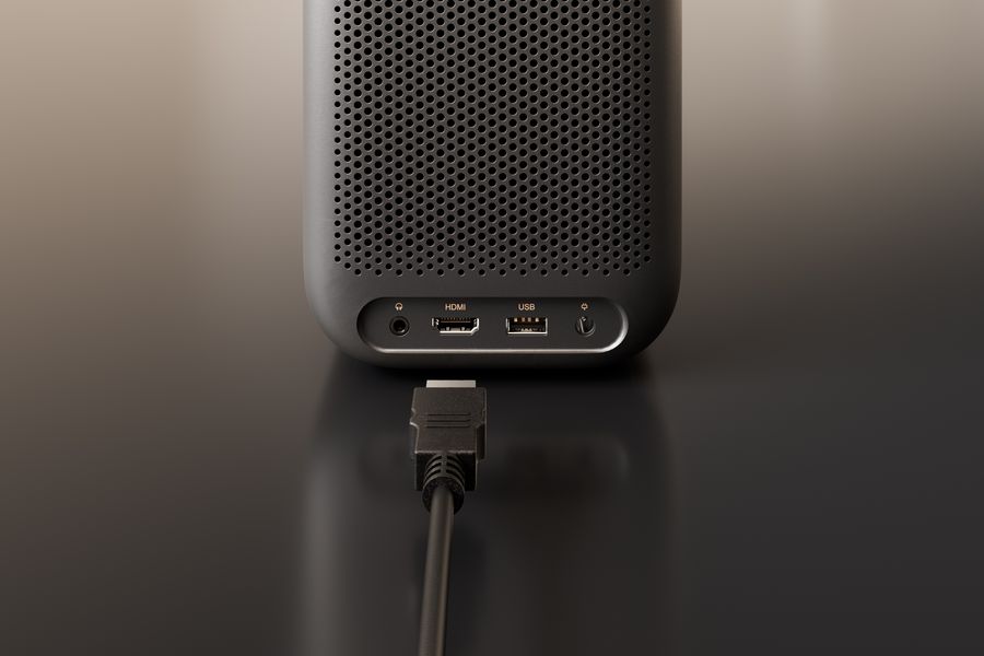 Connectique du mini projecteur Xming Page Two avec port HDMI 2.1, USB, WiFi, Bluetooth et compatibilité Google Cast.