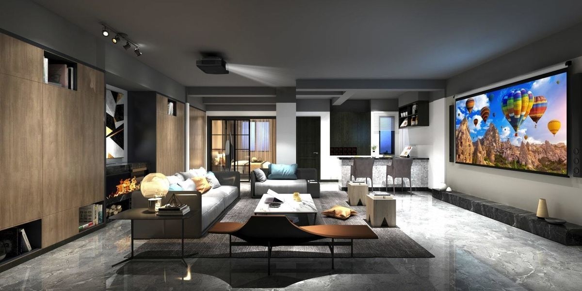 Projecteur Epson EH-LS11000W diffusant une image 4K vive et colorée avec des montgolfières sur un écran mural.